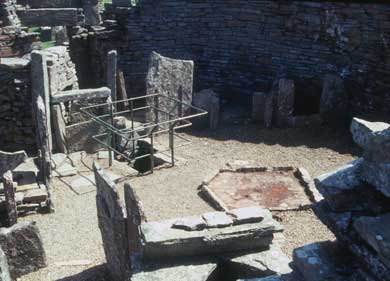 Interior of the Broch looking past the well towards the entrance.