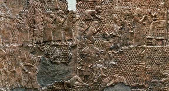 The survivors among the leading citizens of Lachish, pleading for their lives before the king