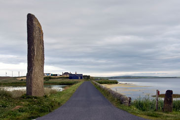 The Watch Stone with the Stones of Stenness in the background 
