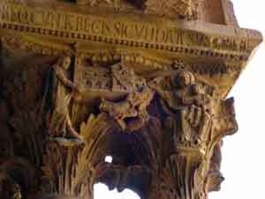 Capital depicting William offering the cathedral to the Virgin