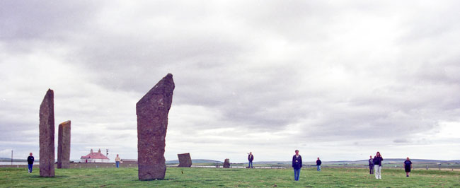 Recreating the stone circle. The small stone, dead centre, does not belong to the circle but is part of the so-called dolmen.