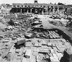 Excavation of the Middle Kingdom Court showing the thresholds and earlier platform.